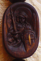 Резная деревянная иконка к нательному крестику. Архангел Михаил.